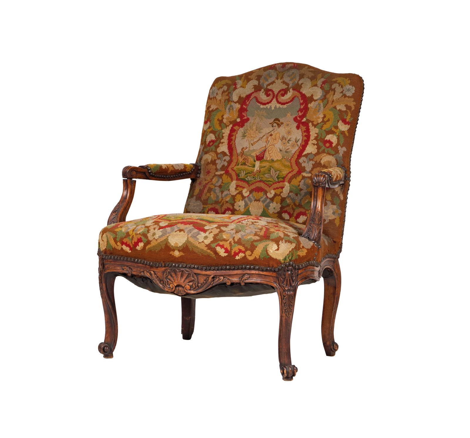 A Louis XV-Style Carved Wood Fauteuil: upholstered with needlepoint 38 1/2 x 29 1/2 x 20 in. (97.8 x 74.9 x 50.8 cm.) Seat height: 16 in. (40.6 cm.)