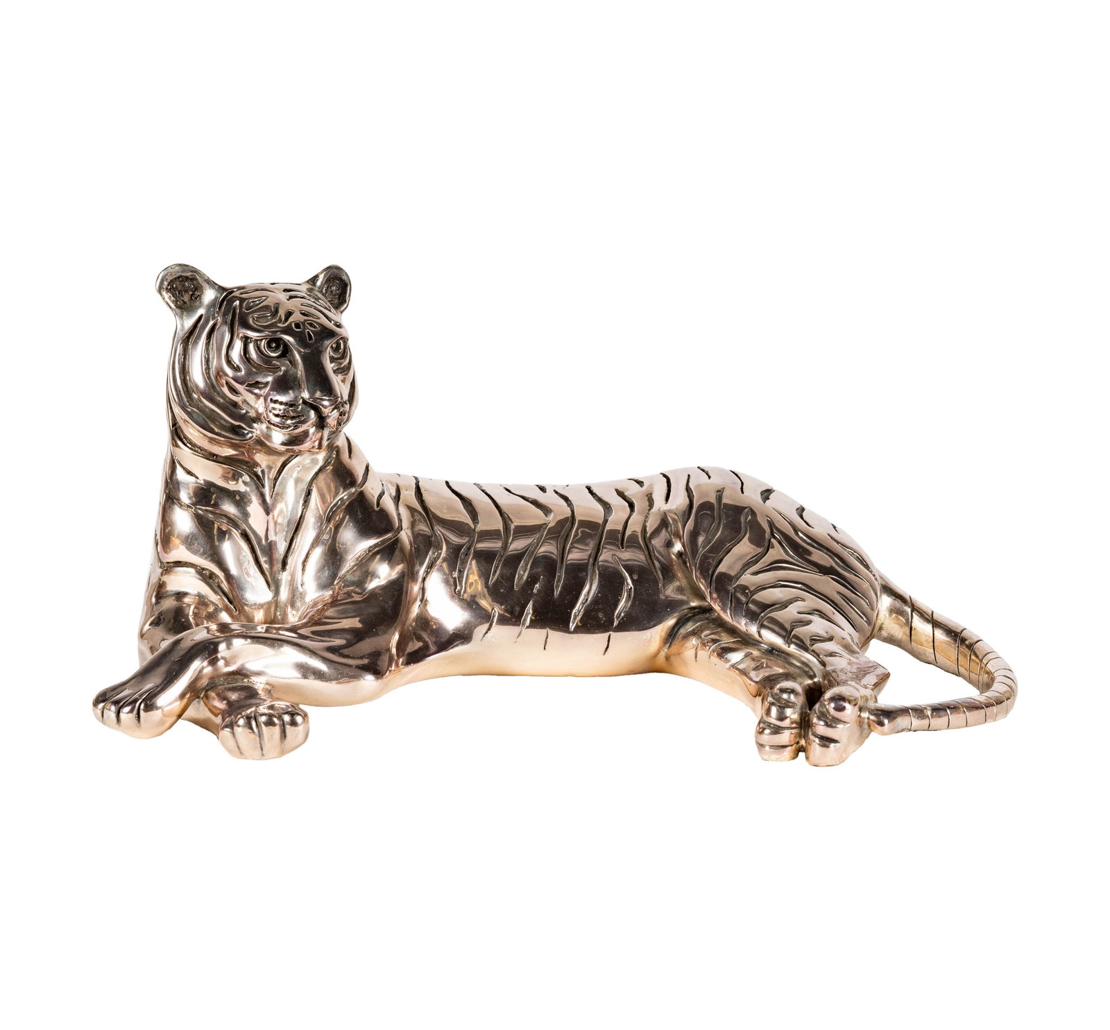 Ricardo del Rio for D'Argenta, Recumbent Tiger: gilt silver overlay; with manufacturer's label to underside 10 1/2 x 21 x 13 1/2 in. (26.7 x 53.3 x 34.3 cm.)