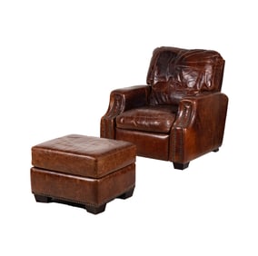 A Brown Leather Club Chair and Ottoman
