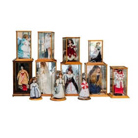 A Group of 12 Porcelain Dolls