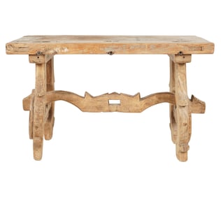 A Rustic Carved Wood Trestle Table