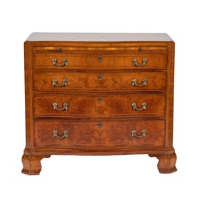 A Chippendale-style Serpentine-Front Four-Drawer Chest