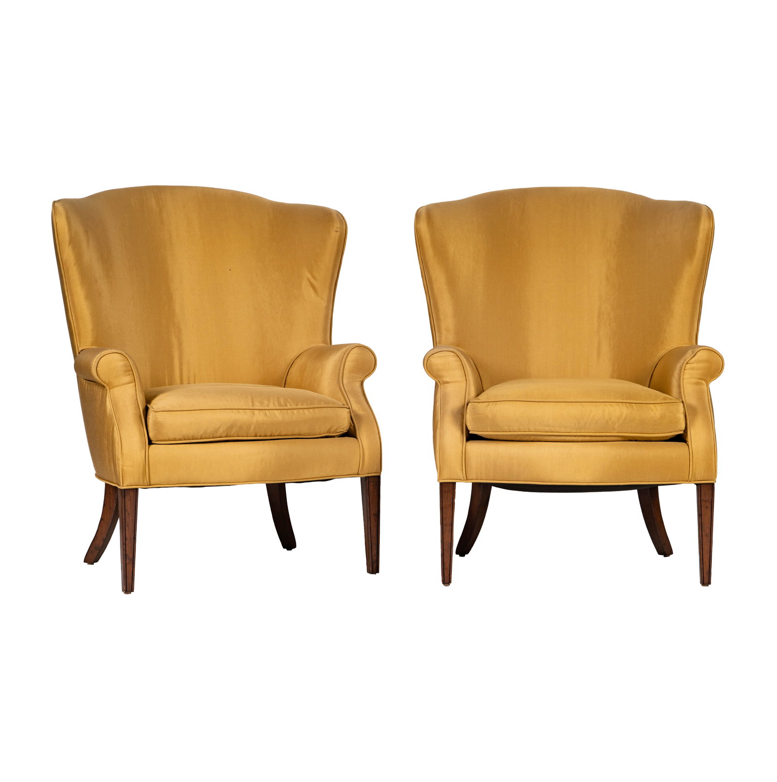 A Pair of Gold Fabric Upholstered Chairs: with removable cushions; unsigned 43 x 33 x 24 in. (109.2 x 83.8 x 61 cm.) Seat height: 20 in. (50.8 cm.)