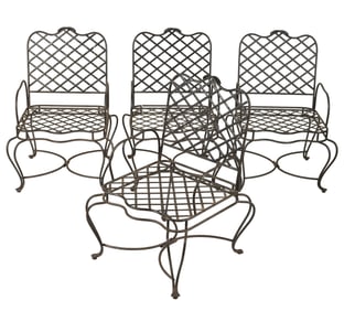 A Set of Four Iron Patio Armchairs