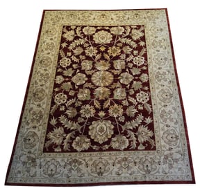 A Pakistani Red Field Area Rug 16'4" x 10'1"