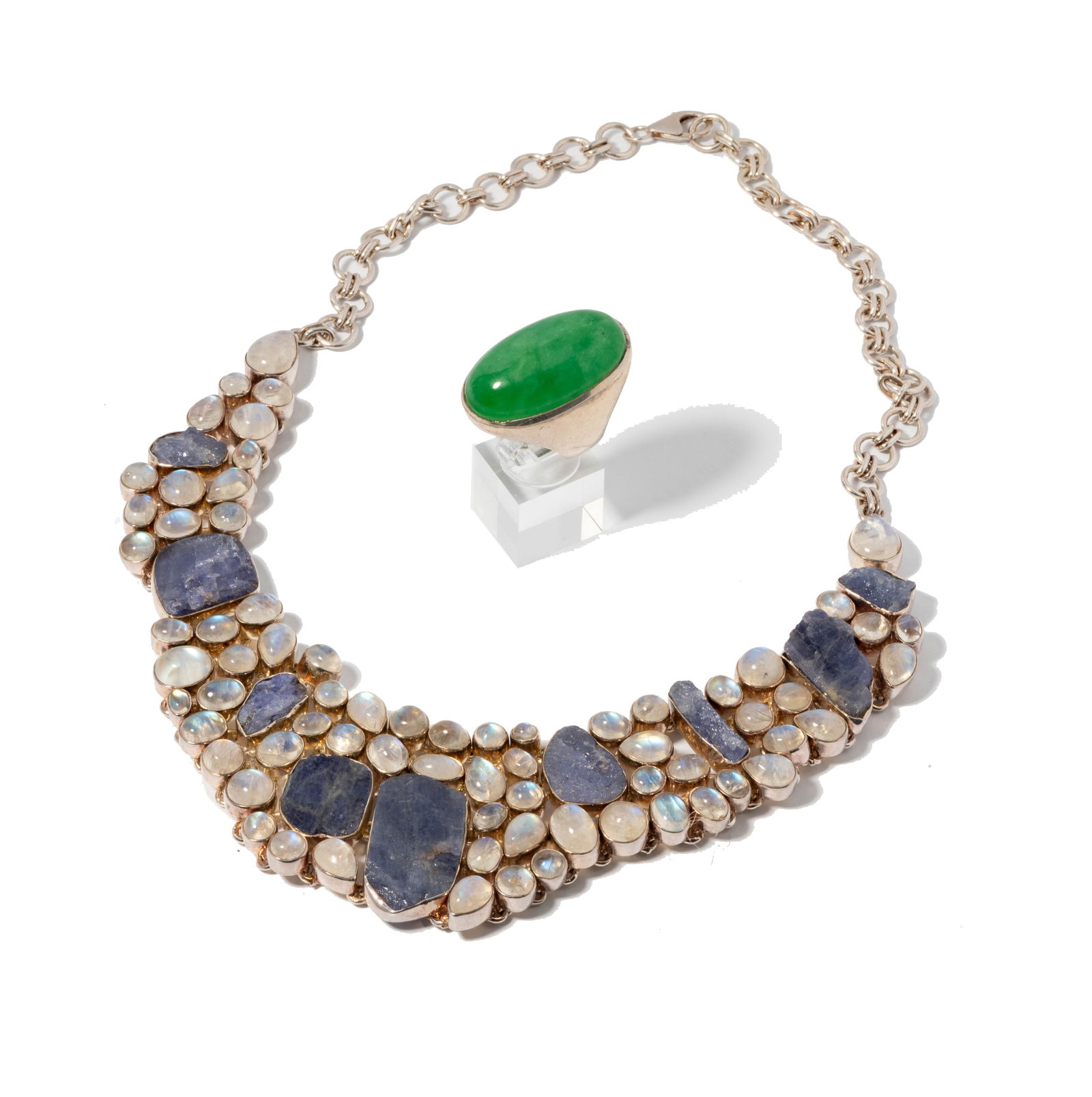 Sterling Silver Gem-set Ring and Necklace: Including one tanzanite and moonstone necklace, measuring 19 inches wearable length; and one sterling and green-stone ring size: 6-1/2; together weighing 212 grams;