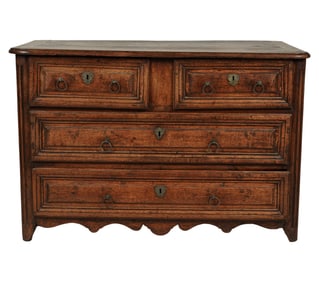 An Antique Carved Wood Four-Drawer Chest