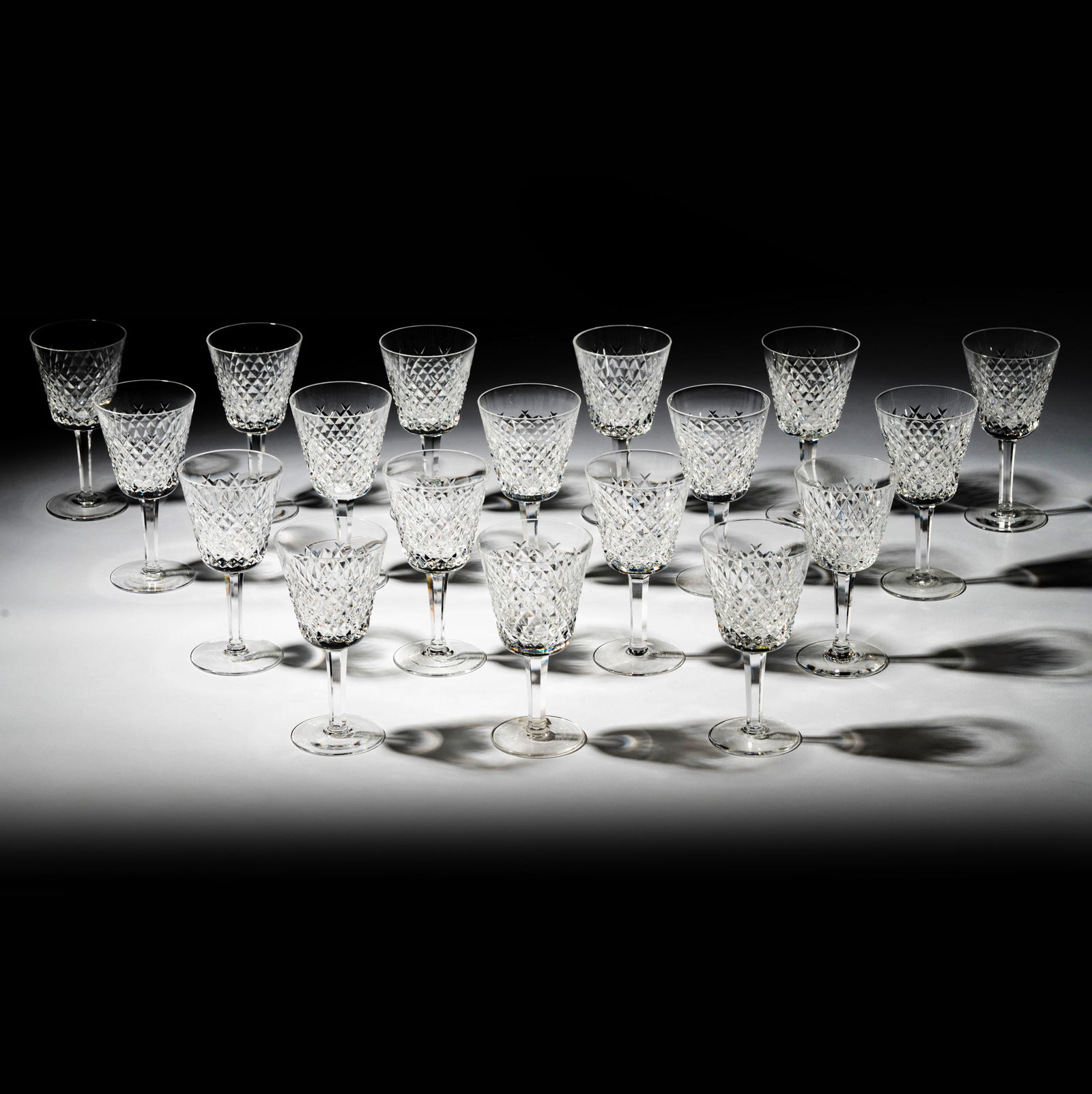 A Set of Eighteen Waterford Alana Crystal White Wine Glasses: each marked to underside 5 3/4 x 3 in. (14.6 x 7.6 cm.) high