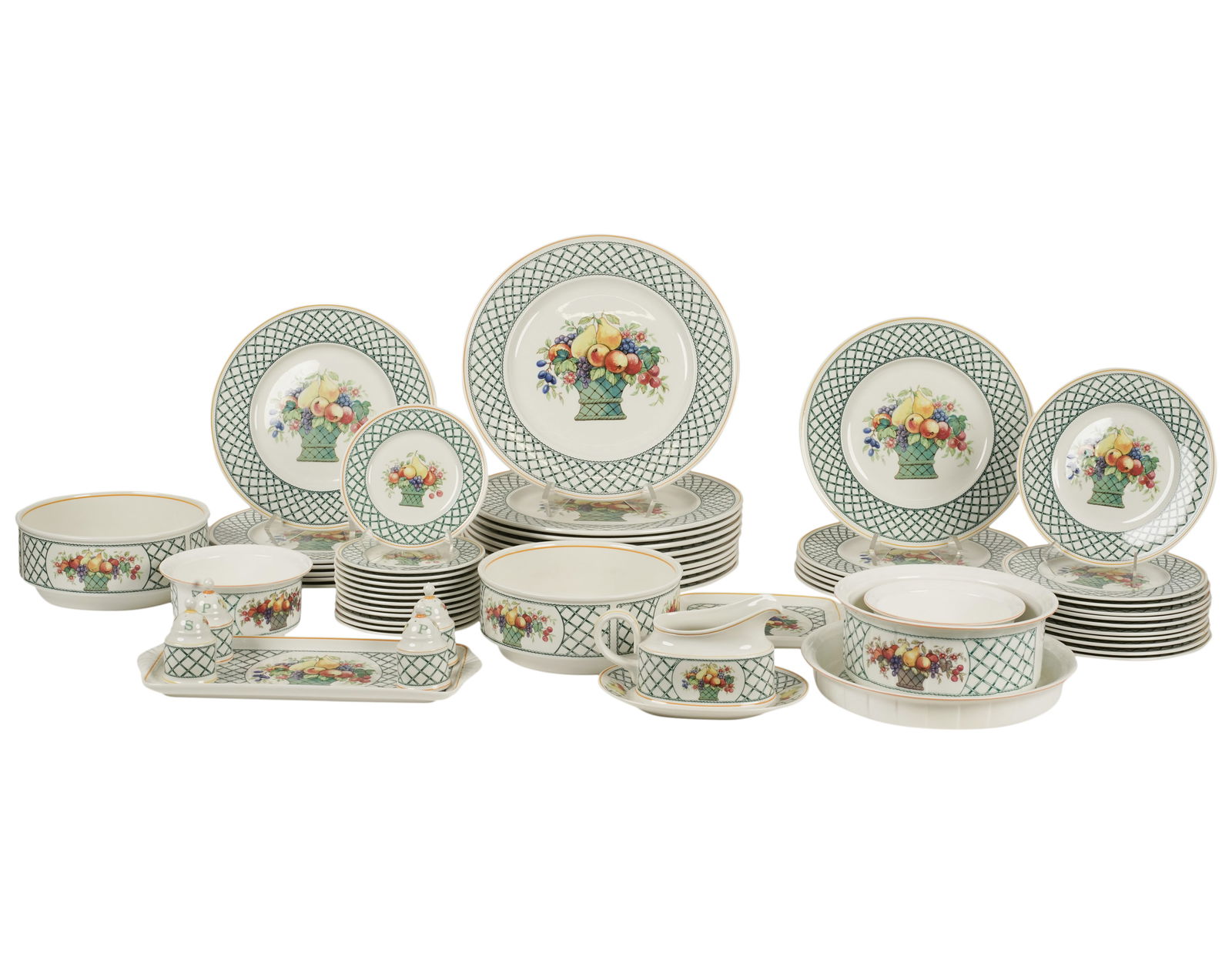 A Villeroy and Boch "Basket" Porcelain Dinnerware: each signed to underside. including: oval tray (16 in. wide), 12 lunch plates (10 1/2 in. dia.), 12 bread plates (6 in. dia.), 11 salad plates (8 in. dia.), 11 dinner plates (12 1/2 in. dia.), four co