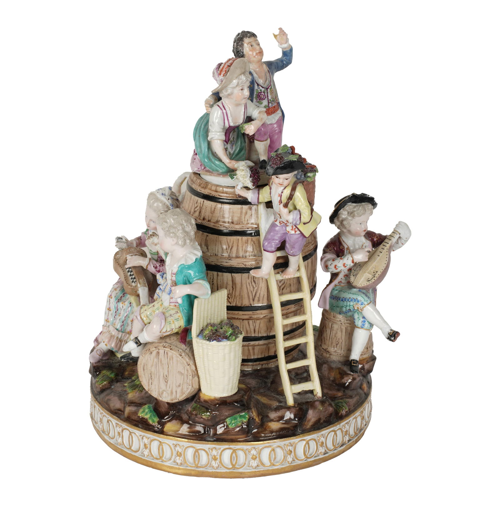 A Meissen Wine Making Figural Porcelain Group: with removable barrel lid; underglaze blue crossed swords mark 12 x 9 x 8 in. (30.5 x 22.9 x 20.3 cm.)
