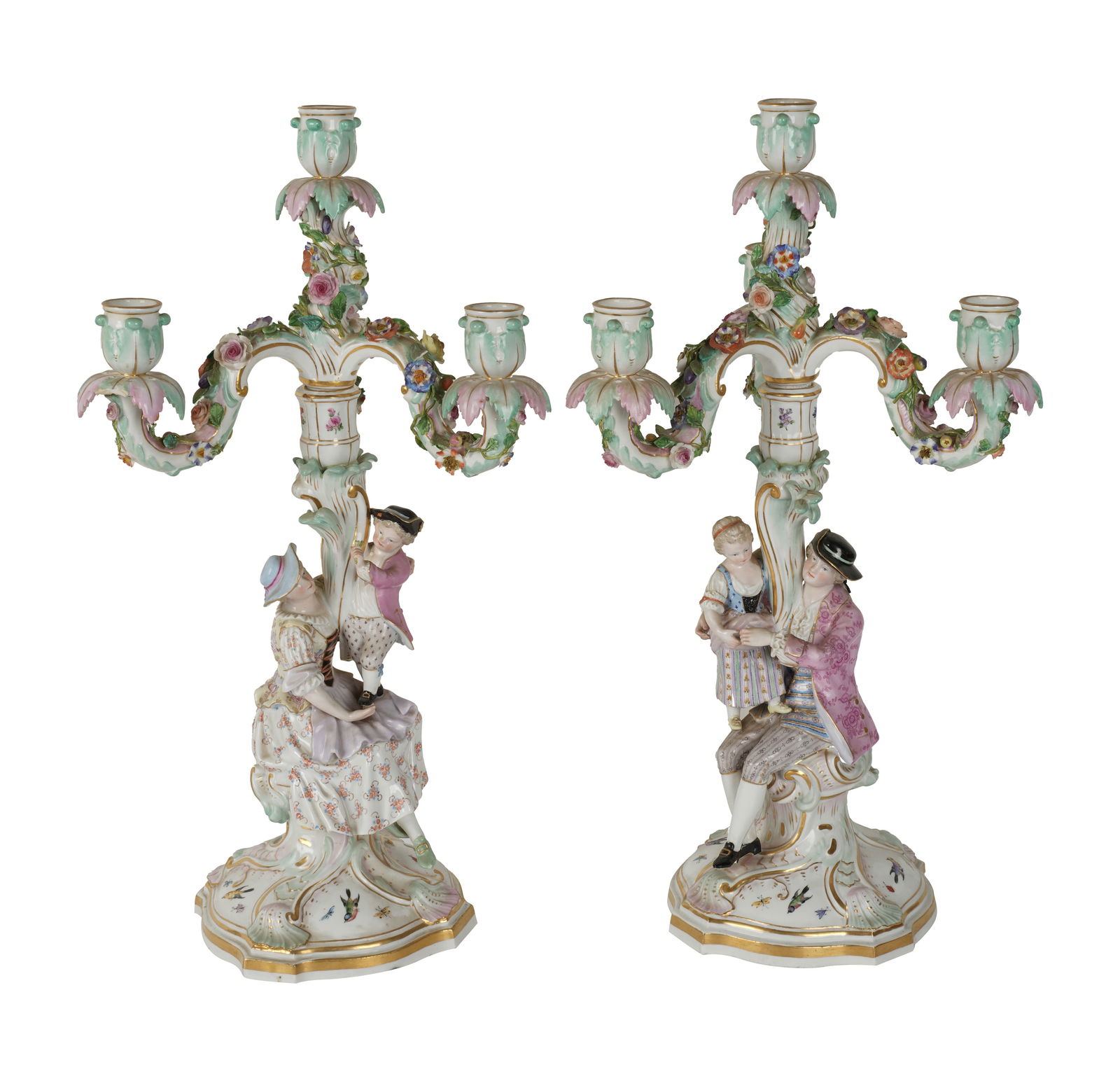 A Pair of Meissen Porcelain Three-Light Candelabra: each convertible to a candlestick; each with underglaze blue crossed swords mark, one incised "D 176." and impressed "51.", the other incised "D 177." and impressed "51." and "28" 19 x 9 x 9 in. (48.3