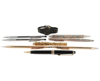 A Collection of Pens and Watch