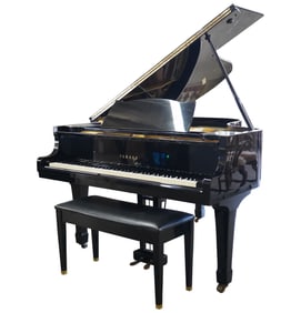 A Yamaha Ebony Grand Piano with Bench