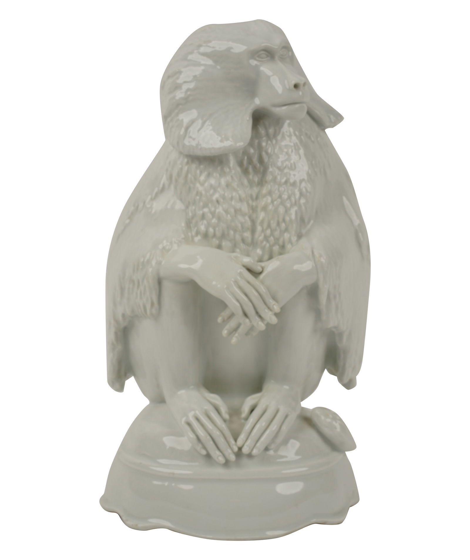 A Meissen White-Glazed Porcelain Baboon Figure: with underglaze blue crossed swords mark, incised crossed swords mark (twice) and incised "H 255" and impressed "59"; 10 in. (25.4 cm.) high