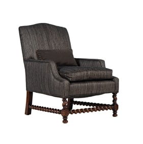 An Upholstered Armchair with Barley Twist Stretchers