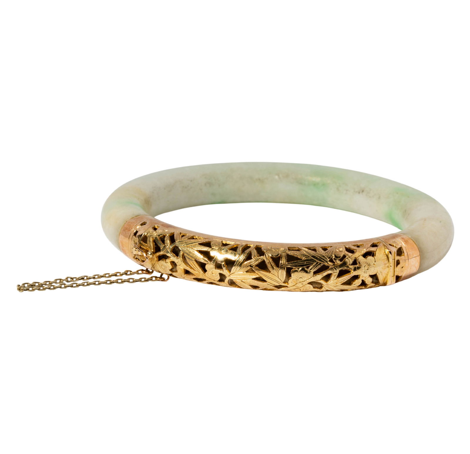 14 Karat Yellow Gold Jade Bangle: Including one Jade and gold accent bangle measuring 7-3/4 inches inside and 10.15mm in width, weighing 60 grams;