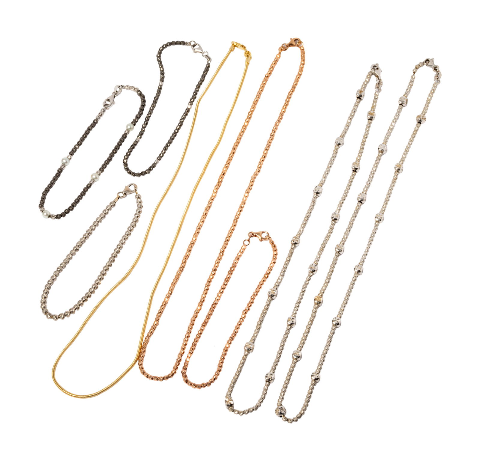 Group of 14 Karat Beaded Gold Necklaces and Bracelets: Including four assorted 14 karat gold necklaces measuring 17-1/4 to 16-1/4, and four assorted bracelets, three measuring 7-1/4 and one measuring 6-1/2 inches long; together weighing 51.4 grams total;