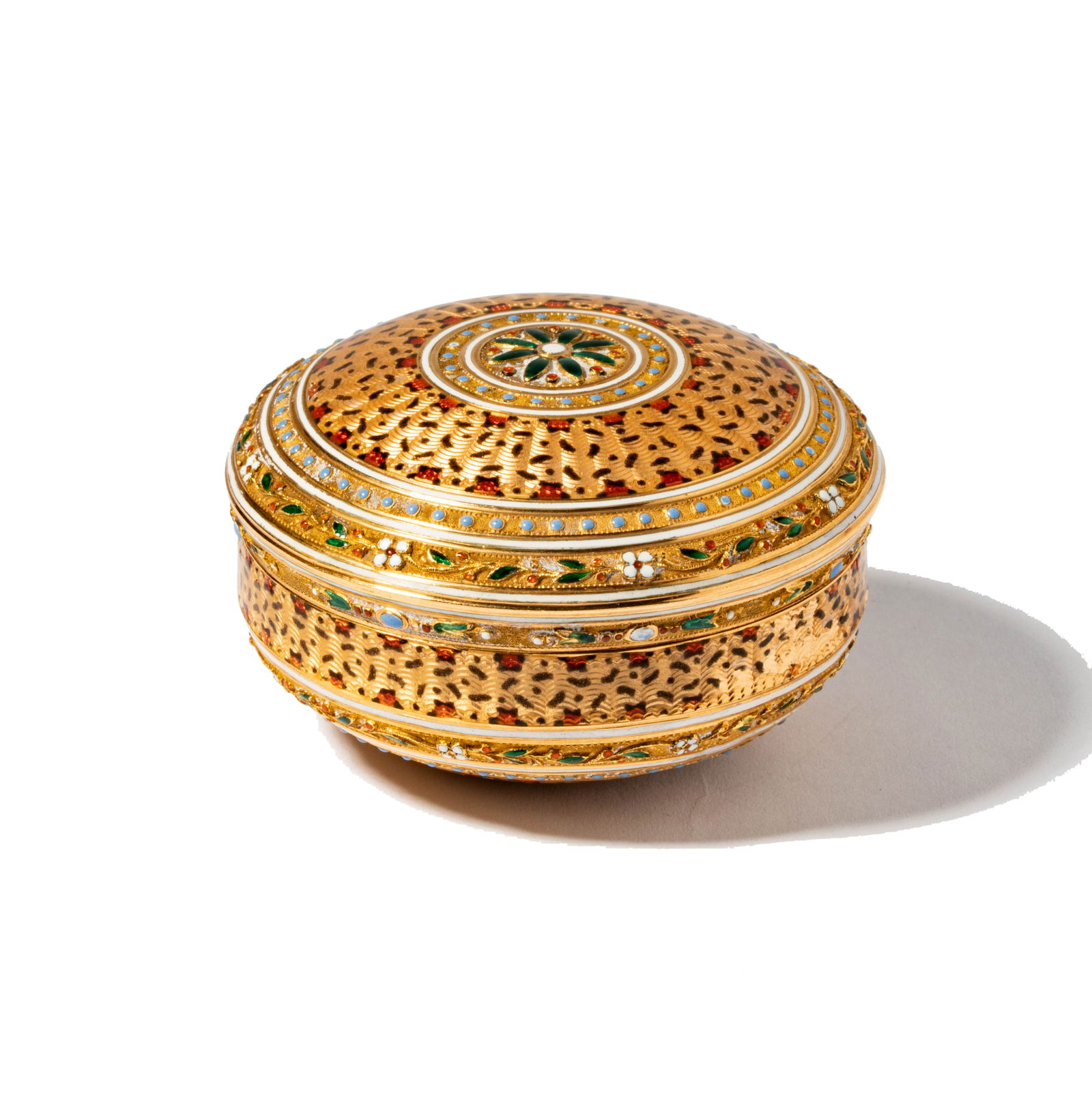 18 Karat Yellow Gold and Enamel Box: Including one enameled gold circular box; measuring 2-1/4 inches diameter x 1-1/8 inches high and weighing 68.9 grams