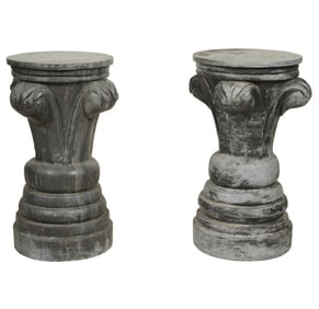 A Pair of Carved Stone Pedestals