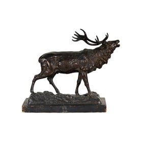 A Patinated Bronze Figure of a Stag