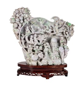 A Chinese Carved Jade Mythological Group