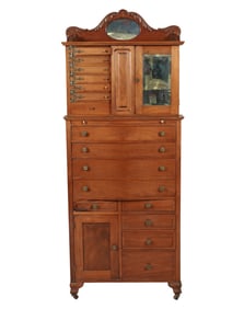 A Ransom and Randolph Co. Victorian Oak Dental Cabinet
