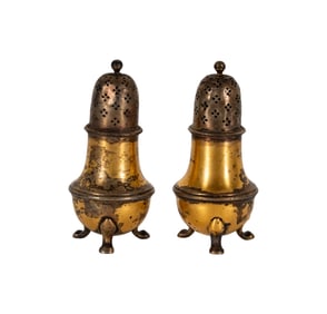 A Pair of Tiffany and Co. Gilt Sterling Salt and Pepper Shakers