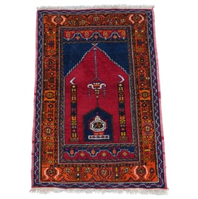 A Persian Prayer Rug 4' x 2'9"