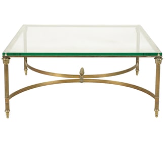 A Hollywood Regency Brass and Glass Coffee Table