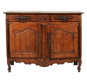 A Louis XV Provincial Carved Fruitwood Buffet