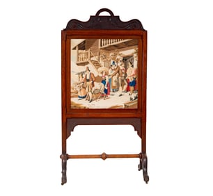 A Victorian Carved Wood and Needlepoint Fire Screen