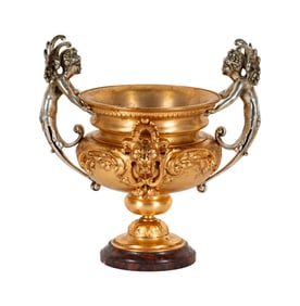 A Continental Gilt and Silvered Metal Urn