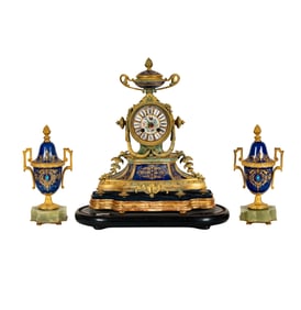 A French Gilt Metal, Porcelain and Onyx Three-Piece Clock Garniture