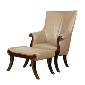 A Scrolled Wing Chair with Footstool