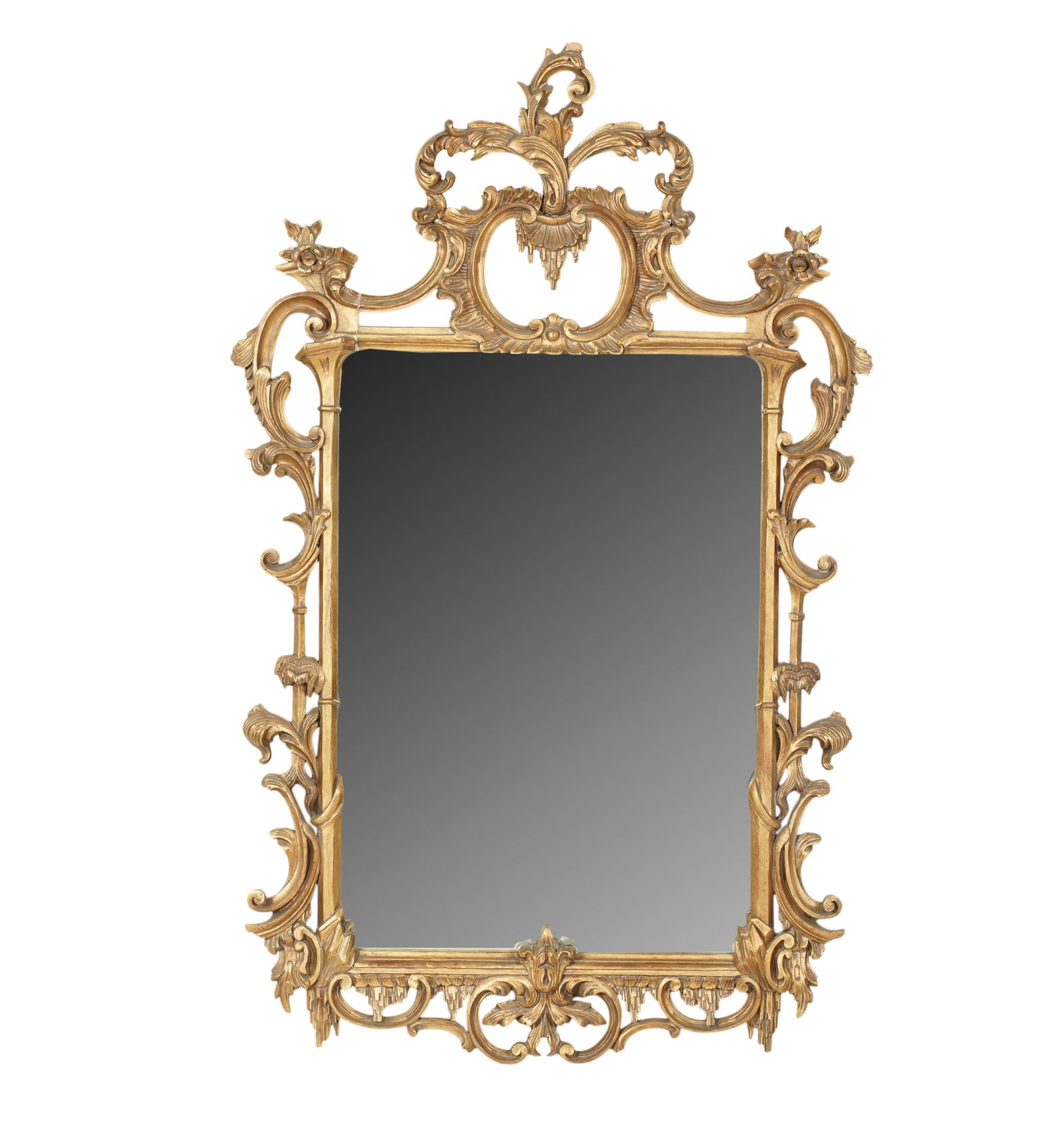 A Carved Giltwood Wall Mirror: after 1950 56 1/2 x 35 in. (143.5 x 88.9 cm.)