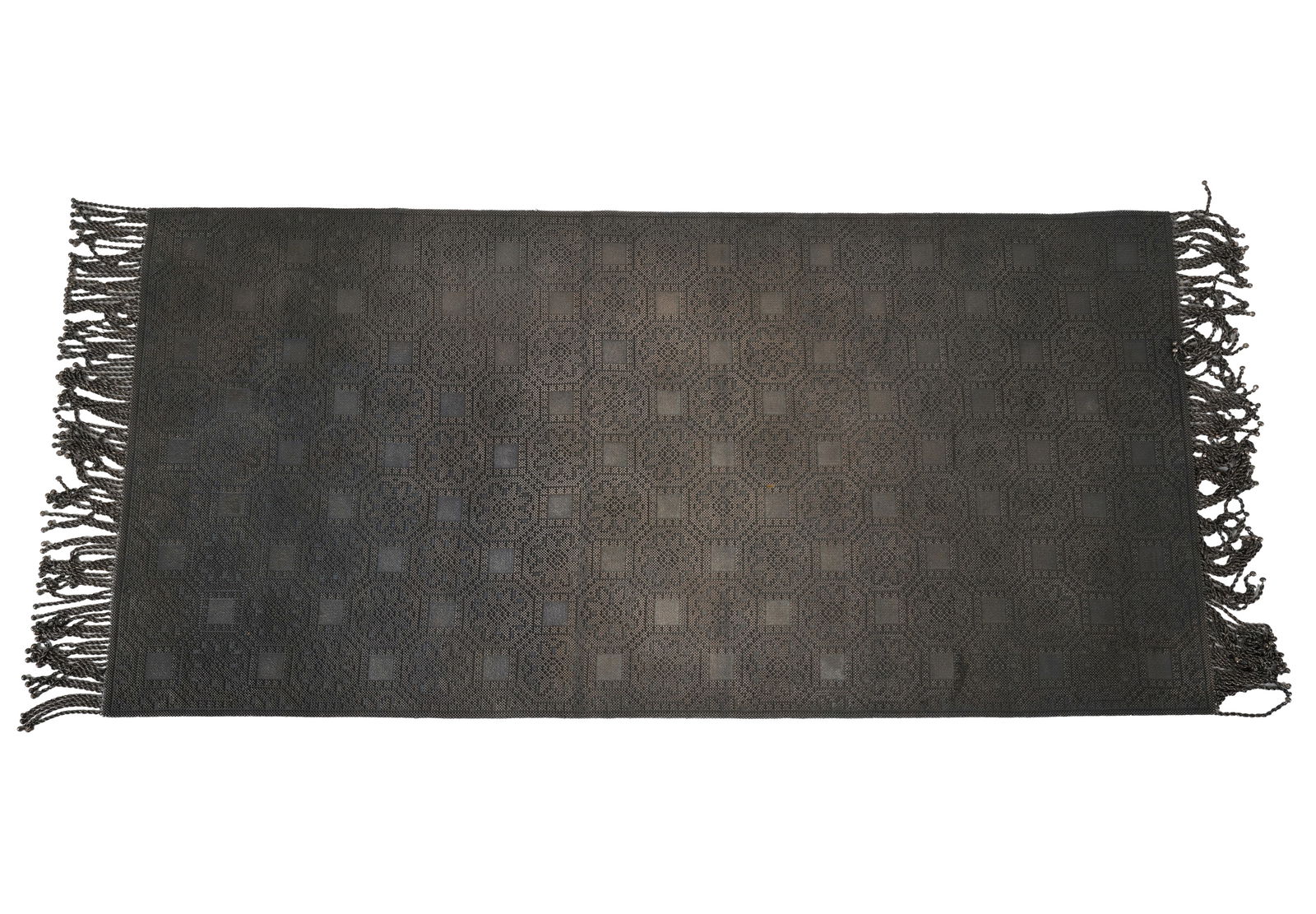 A Silver Table Mat: 36 x 16 1/2 in. (91.4 x 41.9 cm.)