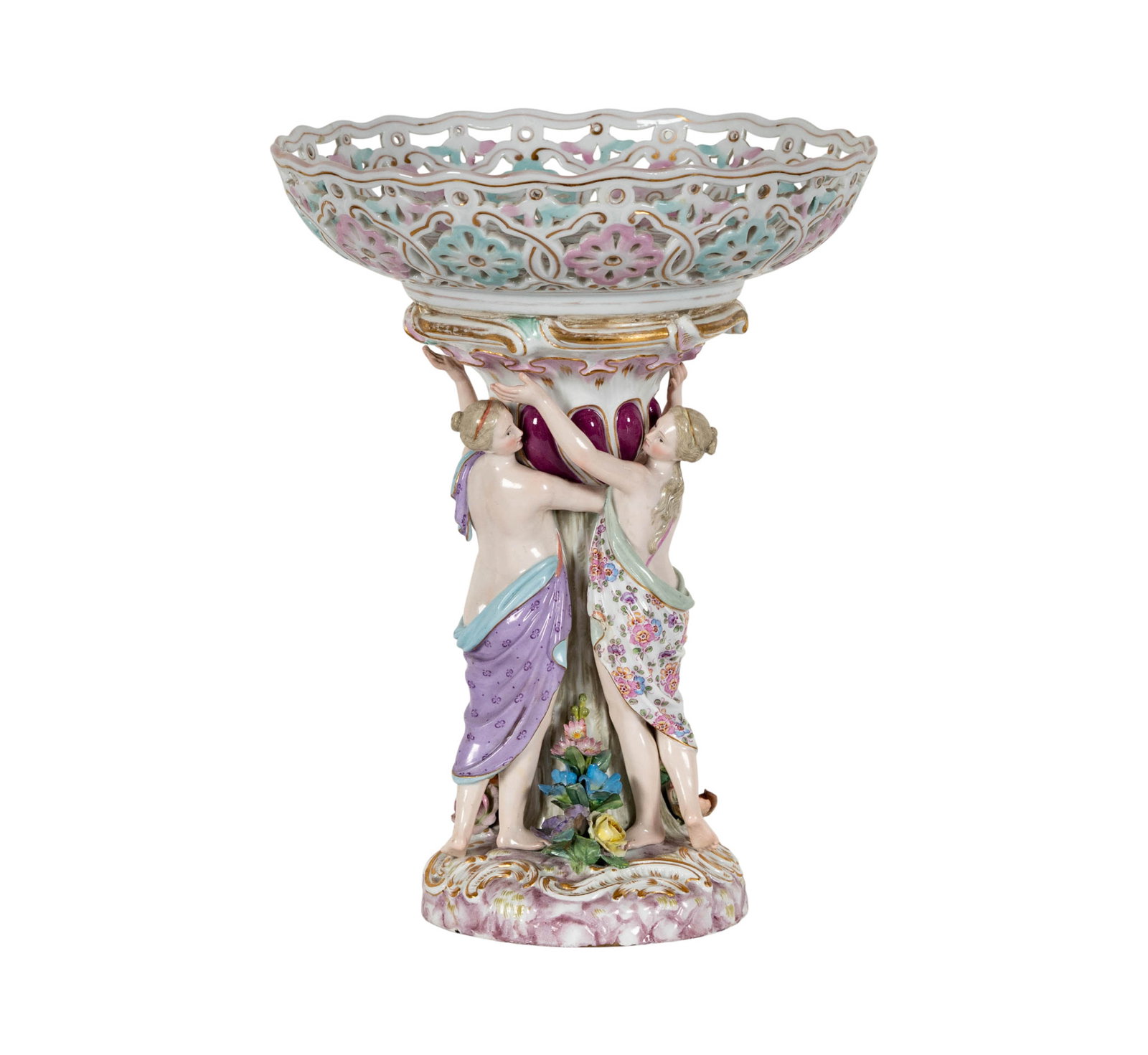 A Meissen Porcelain Figural Center Bowl: underglaze blue crossed swords mark, incised "2685.", impressed "163" and "68", red-painted "28." 12 1/2 x 9 1/2 in. (31.8 x 24.1 cm.)