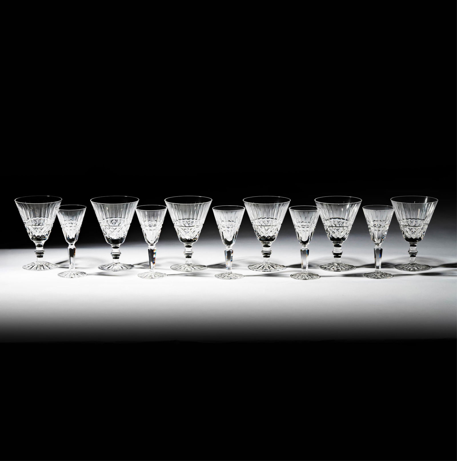 A Waterford Crystal Tramore Partial Service: comprising six goblets (5 1/2 in. high) and five stems (5 1/4 in, high) [11 pieces]