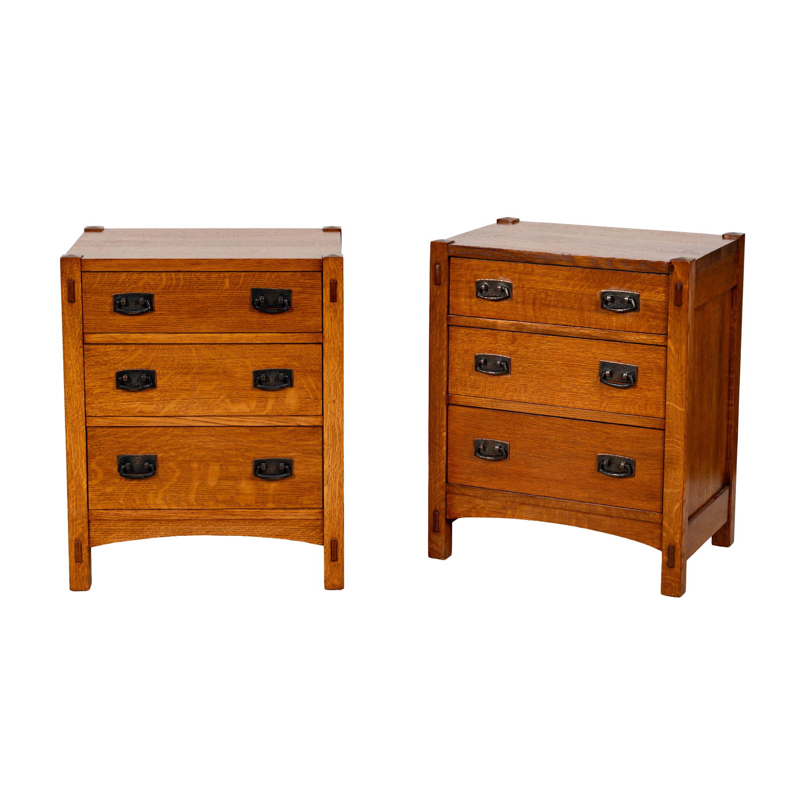 A Pair of Stickley Oak Chests / Nightstands: late 20th century; with labels 28 x 22 x 16 in. (71.1 x 55.9 x 40.6 cm.)