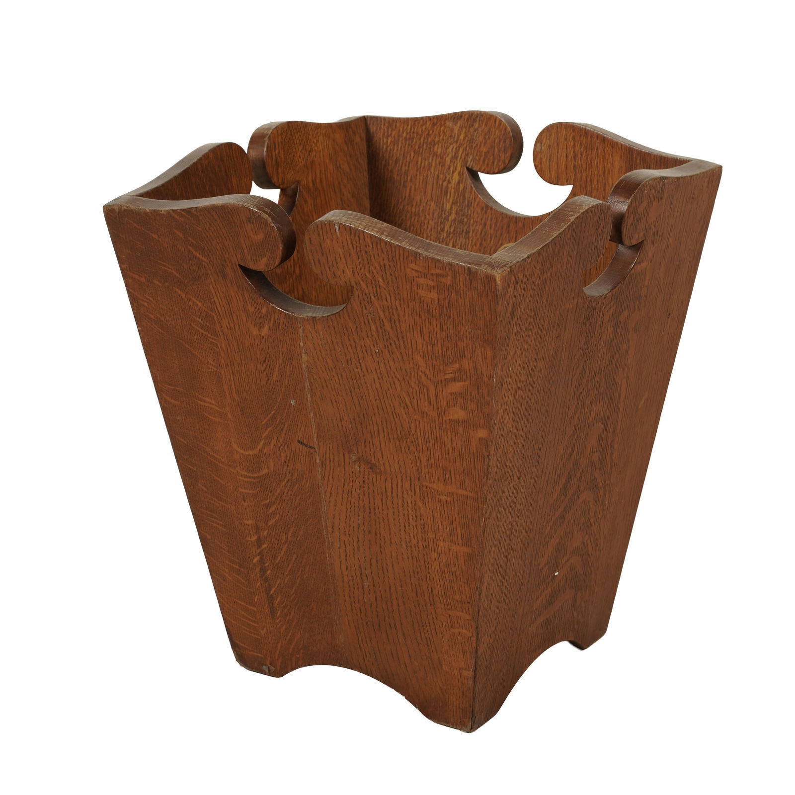 A Stickley Oak Wastebasket: late 20th century; with metal label 16 x 13 1/2 x 13 1/2 in. (40.6 x 34.3 x 34.3 cm.)