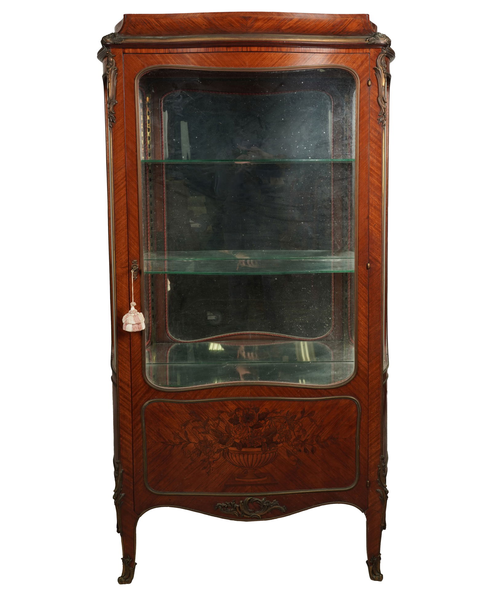 A Louis XV-Style Marquetry-Inlaid Vitrine Cabinet: late 19th / early 20th century; with breche d'alep marble top and mirror-backed interior 66 1/4 x 30 3/4 x 14 1/4 in. (168.3 x 78.1 x 36.2 cm.)