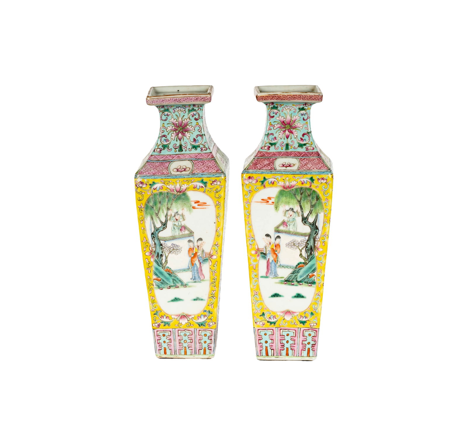 A Pair of Chinese Famille Jaune Porcelain Vases: with seal mark to underside 11 1/2 in. (29.2 cm.) high Provenance: The Beverly Hills estate of a distinguished collector.