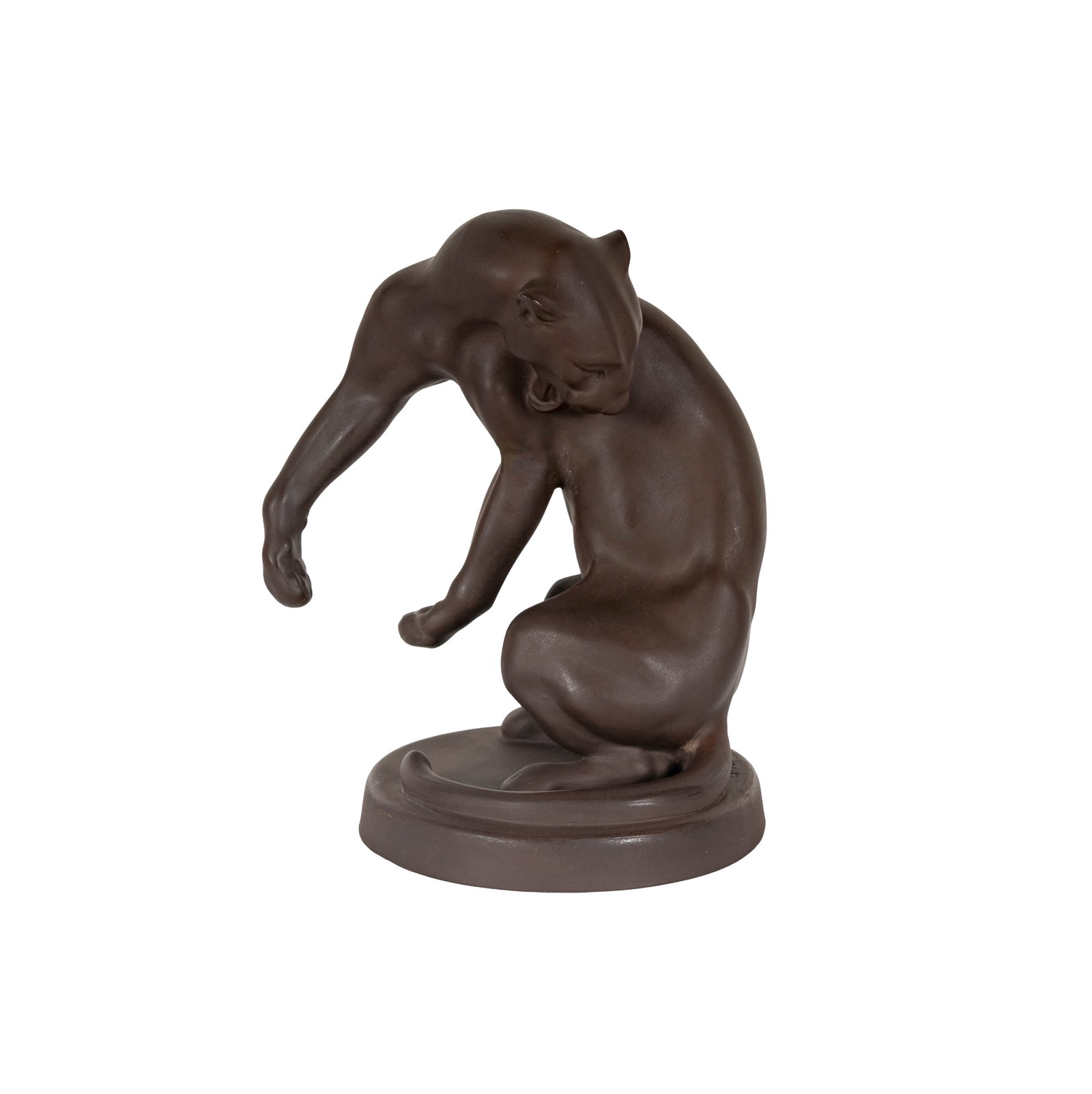 An Erich Oehme Meissen Porcelain Panther Figure: incised and impressed marks to underside, numbered "G. 242" and "59" 7 1/4 x 5 3/4 x 4 1/2 in. (18.4 x 14.6 x 11.4 cm.)