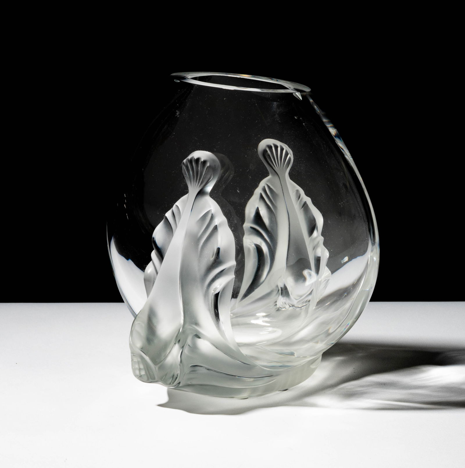 A Lalique Glass Garance Vase: signed "Lalique France" 8 3/4 x 9 x 7 in. (22.2 x 22.9 x 17.8 cm.)