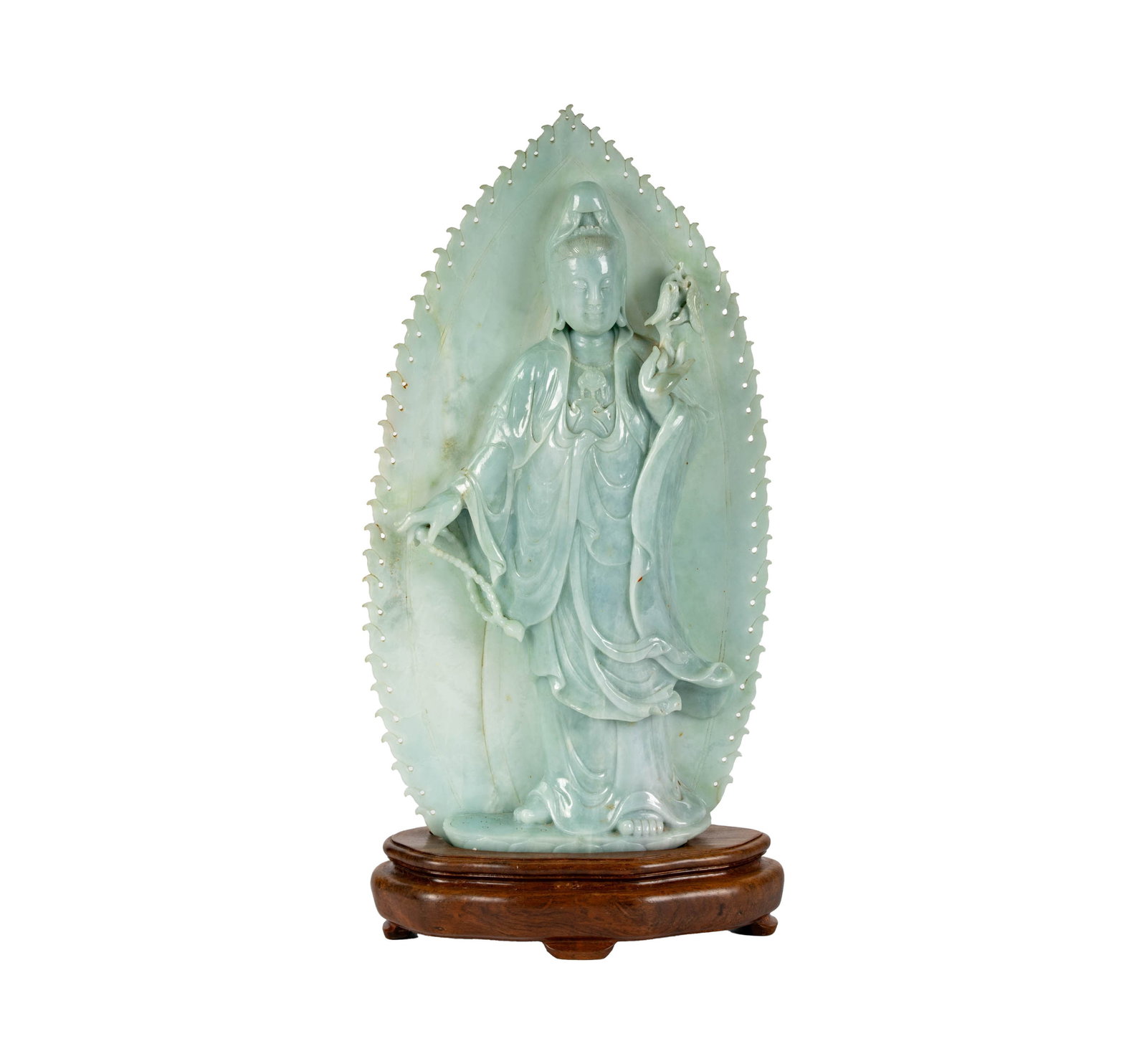 A Chinese Carved Jade Figure of Guan Yin: with a fitted hardwood stand 18 x 10 x 2 1/4 in. (45.7 x 25.4 x 5.7 cm.)