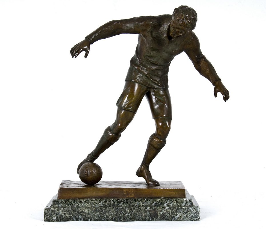 MAURICE GUIRARD-RIVIERE: "SOCCER PLAYER": bronze figure with brown patina, on a green marble plinth inscribed in casting Provenance: Estate of David Copley, La Jolla 12 1/2 inches high