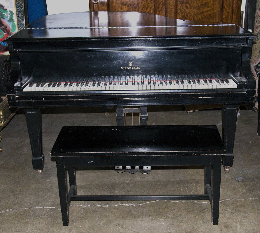 STEINWAY & SONS EBONY CASE GRAND PIANO: with bench; circa 1922, model "O," serial number 219121 Condition: with overall wear to the case 5'10"