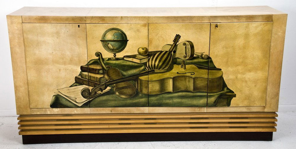 ALDO TURA PAINTED & PARCHMENT DECORATED CABINET: the rectangular top above a pair of folding doors opening to reveal an interior fitted with an FM radio and phonograph equipment, the doors painted with musical instruments; the sides, images of books