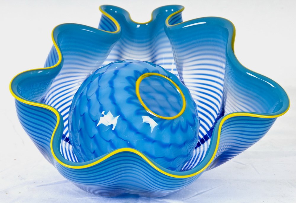 DALE CHIHULY: TWO-PART SEAFORM SET: circa 2011; Portland Press ed. blown glass, in a fitted acrylic case inscribed and dated Provenance: Estate of David Copley, La Jolla the largest bowl measuring 10 1/4 inches long; 5 1/2 inches high