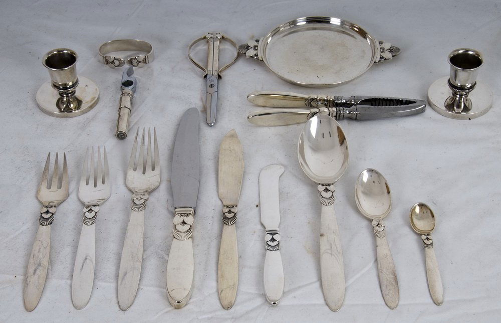 GEORG JENSEN STERLING SILVER FLATWARE: Cactus pattern 156 pieces comprising of: twelve dinner forks, twelve forks, twelve fish forks, twelve dessert forks, twelve dessert/place spoons, twelve soup spoons, four tea spoons, ten large youth t
